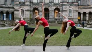 Image of 3 dancers in edinburgh old college quad dancing