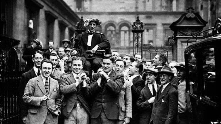 Eric Liddell being chaired from the graduation ceremony at the McEwan Hall