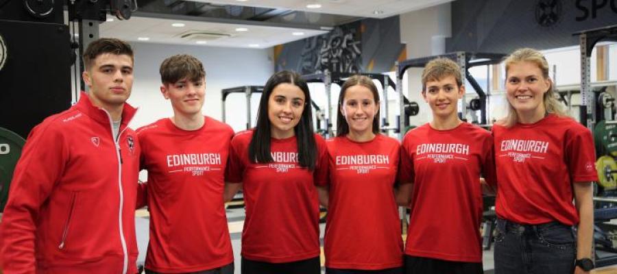 A group of students wearing University of Edinburgh gym tshirts