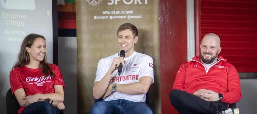 Image of stephen clegg holding microphone smiling next to fiona bunn and mat trodden