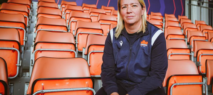 Claire Cruikshank sitting in stadium stand