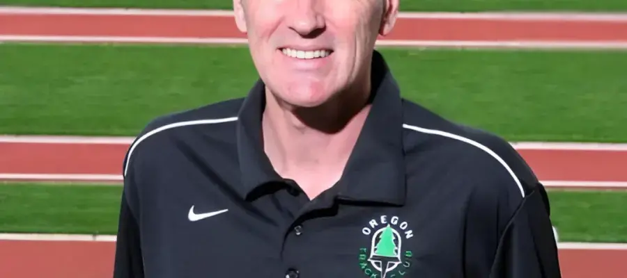 Image of Mark Rowland on athletics track