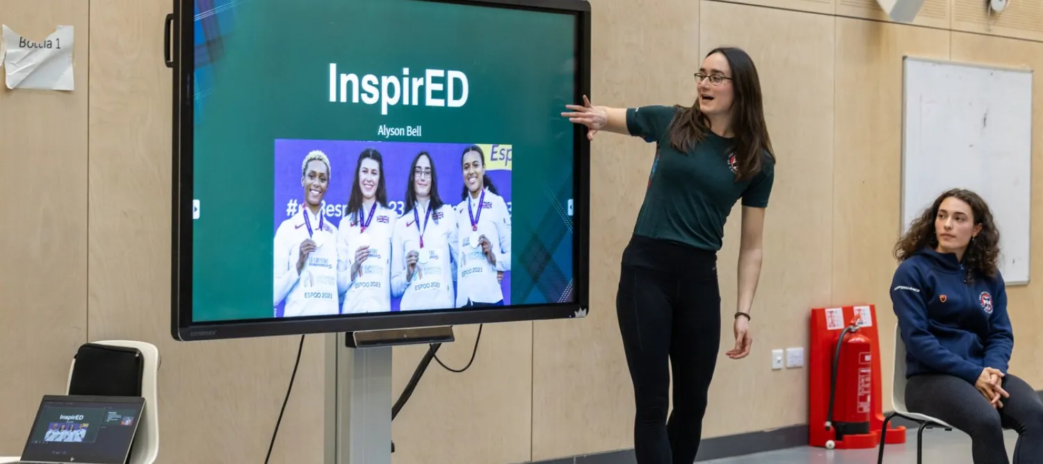 alyson bell presenting with a big screen