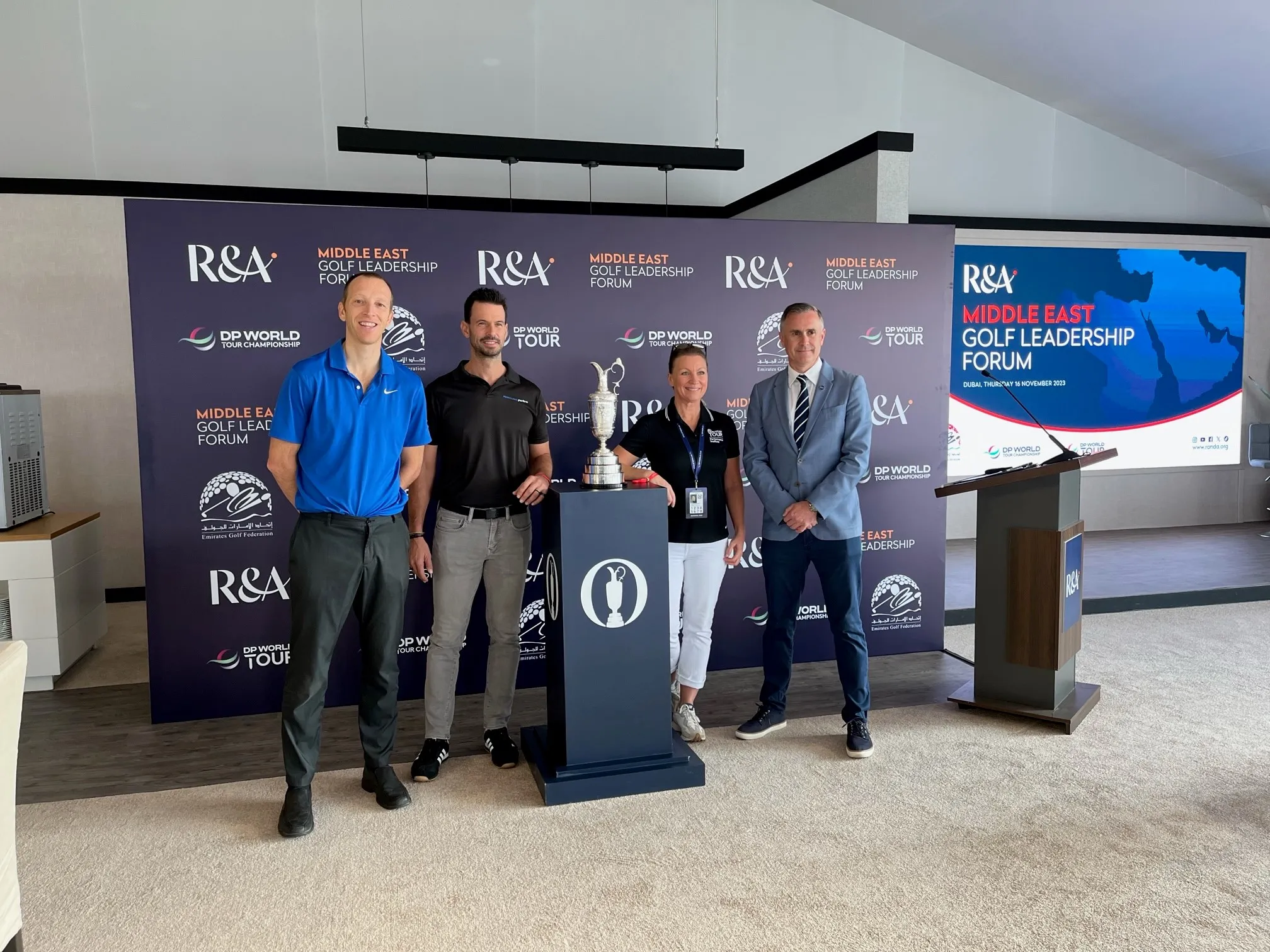 Andrew Murray poses with others by the open cup at the international sport and health forum hosted by the R&A in the middle east