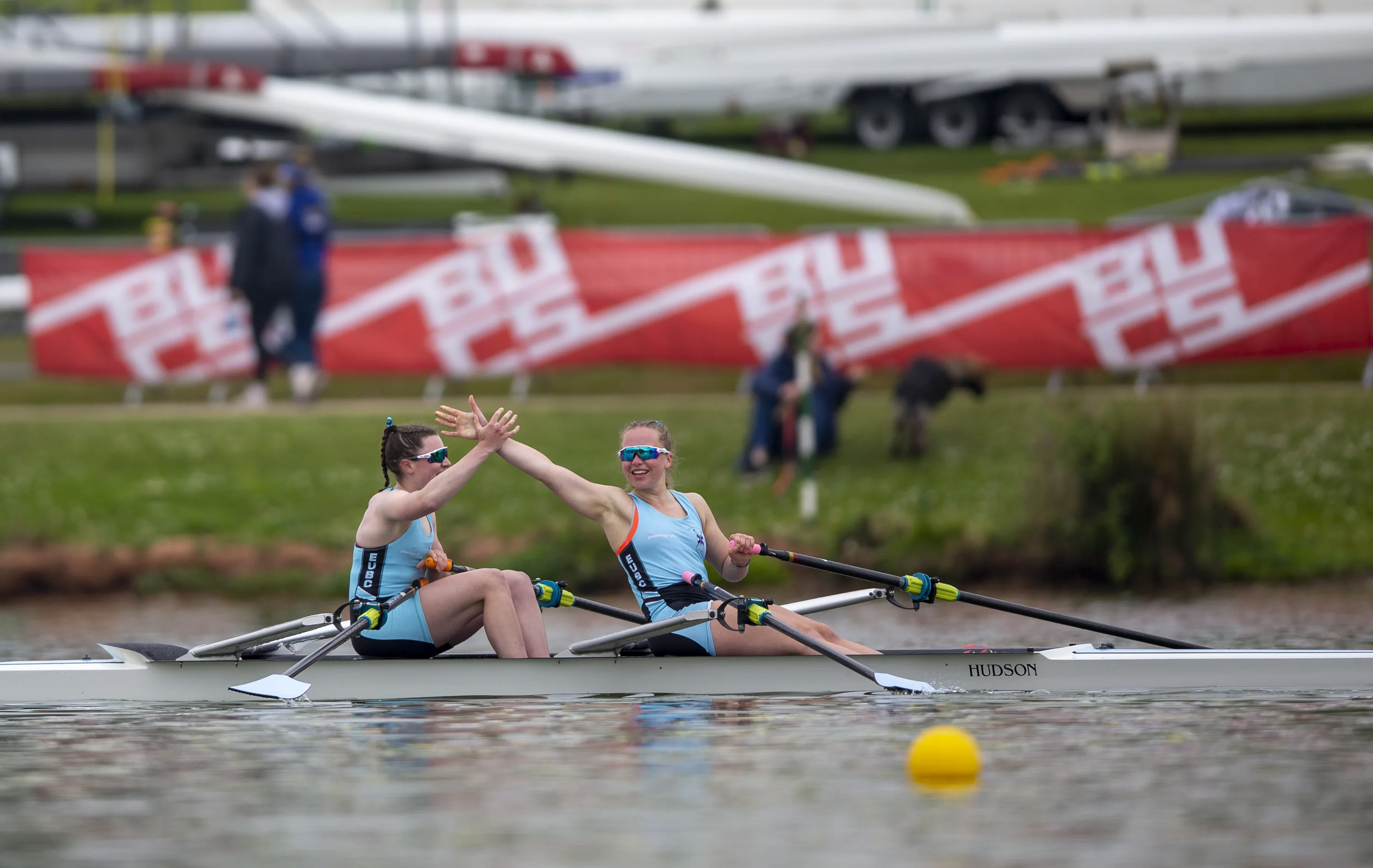 Rowers celebrating on the water