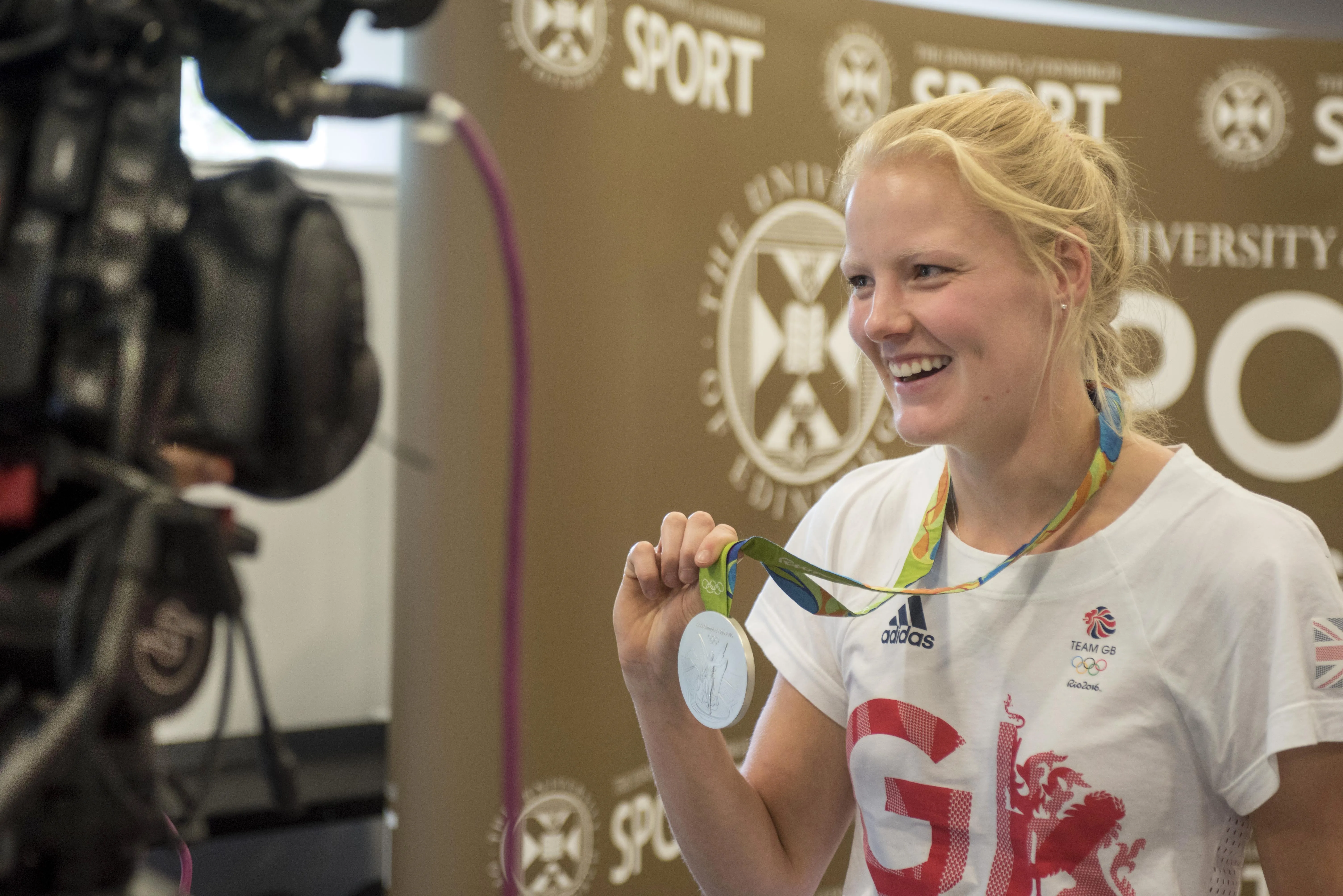 Polly Swann with Olympic Medal