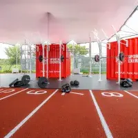 Outdoor gym with weights and track