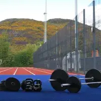 Weights set out in an outdoor gym