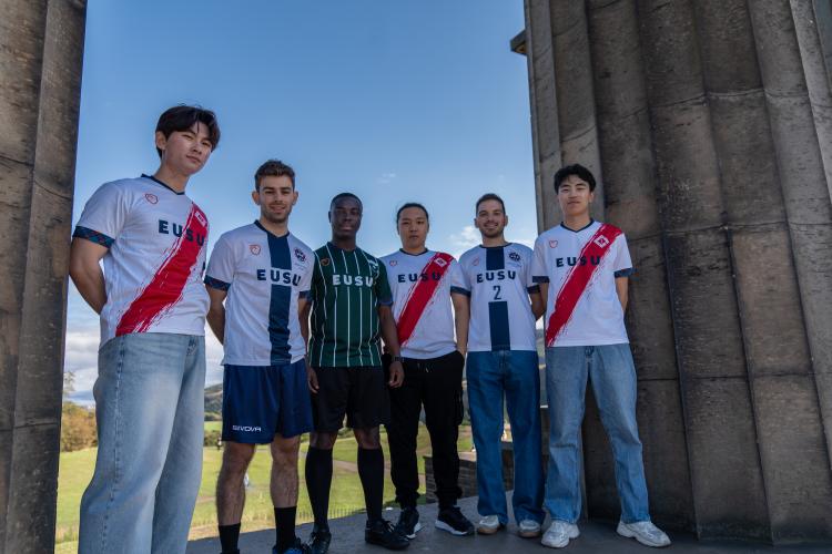 six people stood in new sports kit