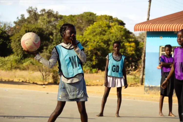 Person throwing netball in Zambia