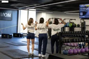 image of women in white tshirts with girls night in logo
