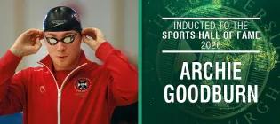 image of swimmer with red jacket and cap