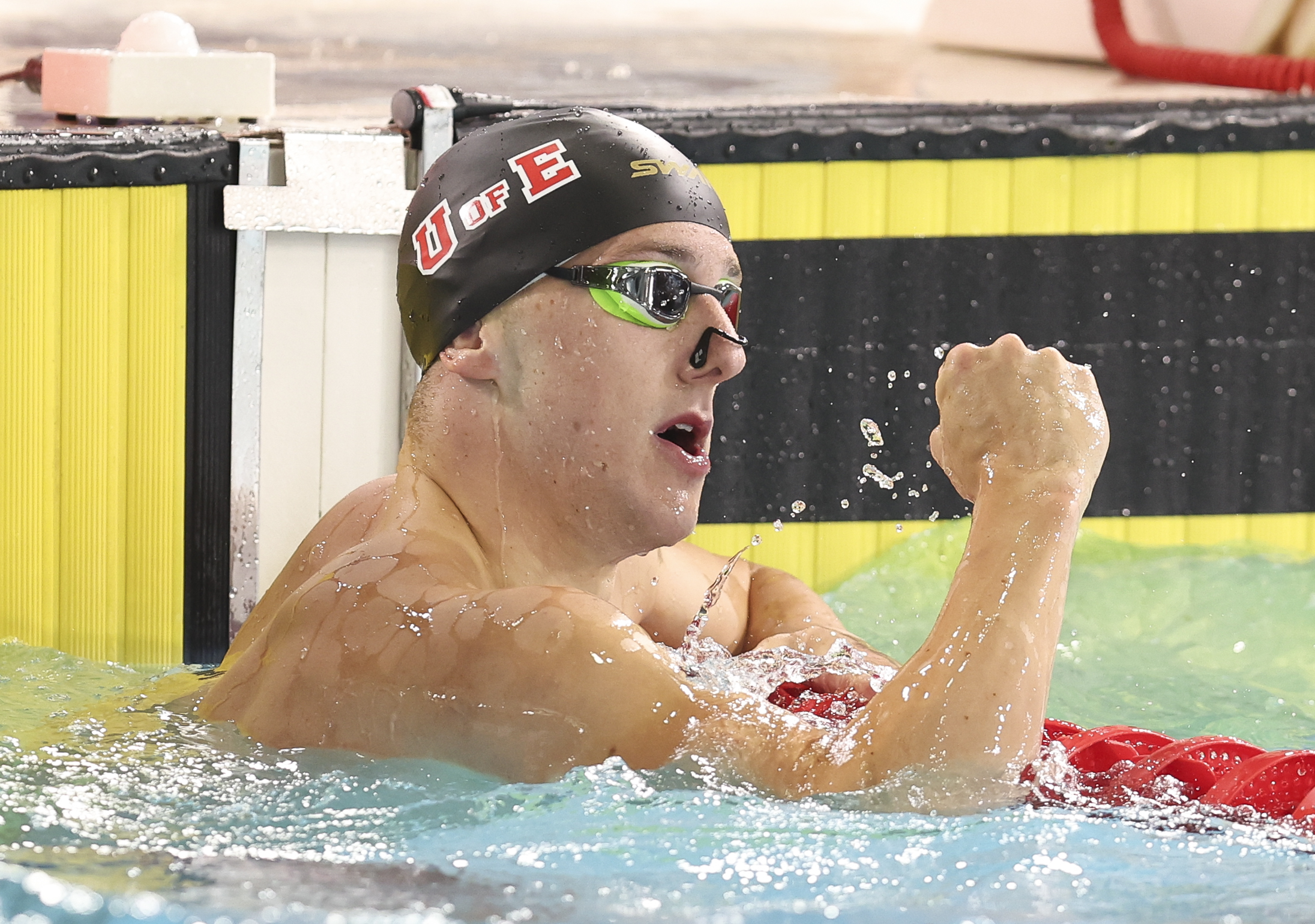 Image of Scott Gibson celebrating in the pool