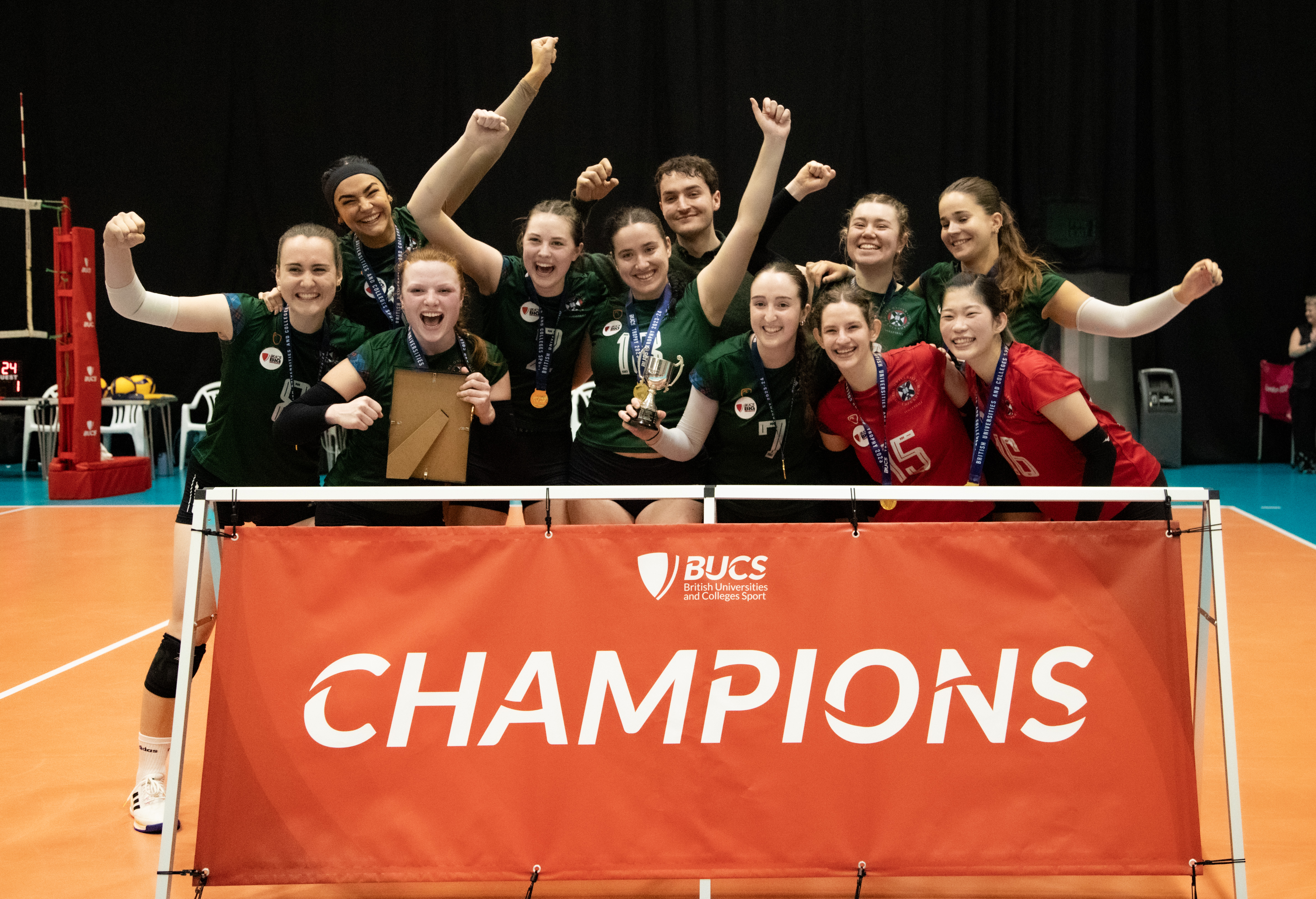 Image of Women's volleyball team lifting Trophy at BUCS Big Wednesday