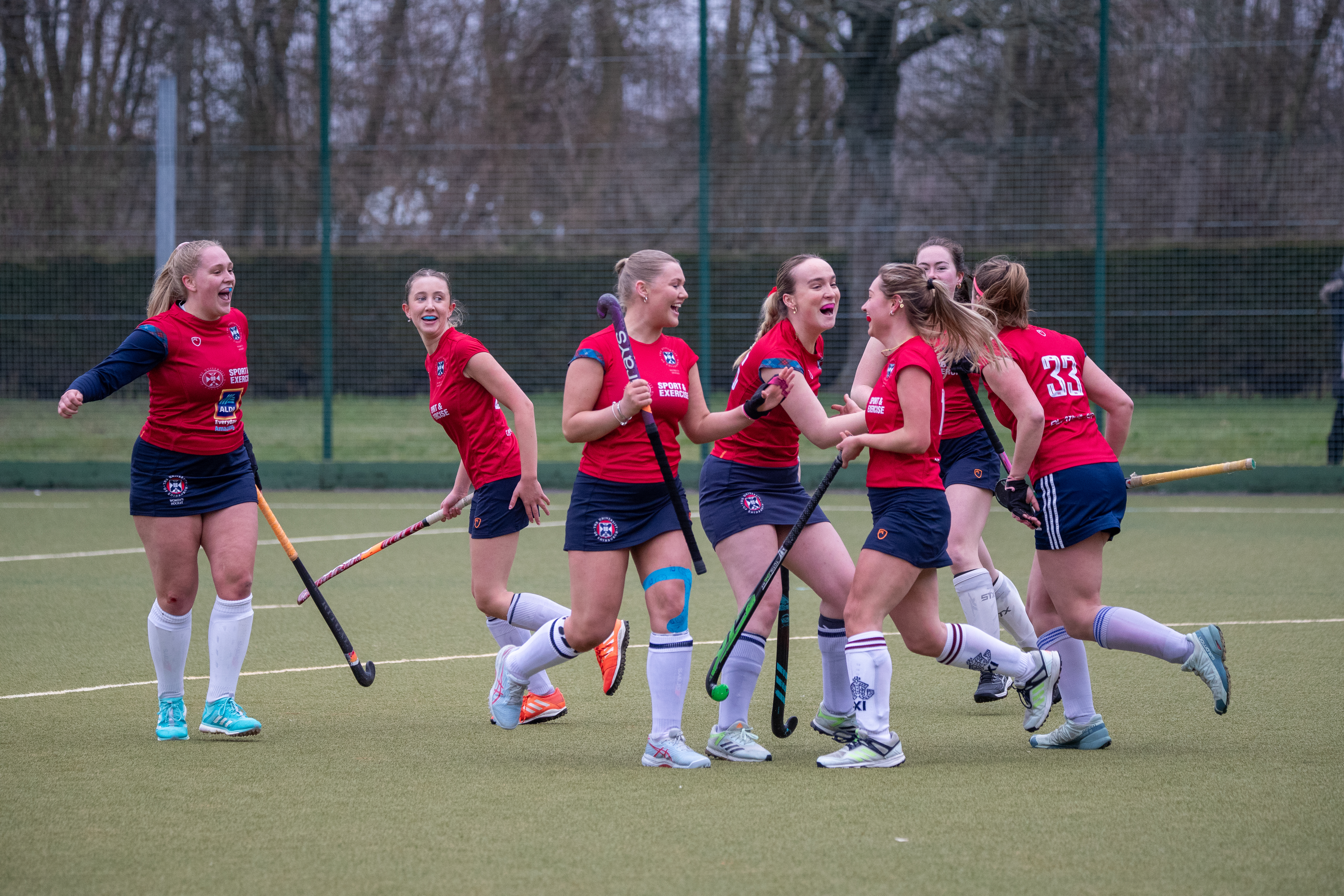 Image of women's hockey team celebrating