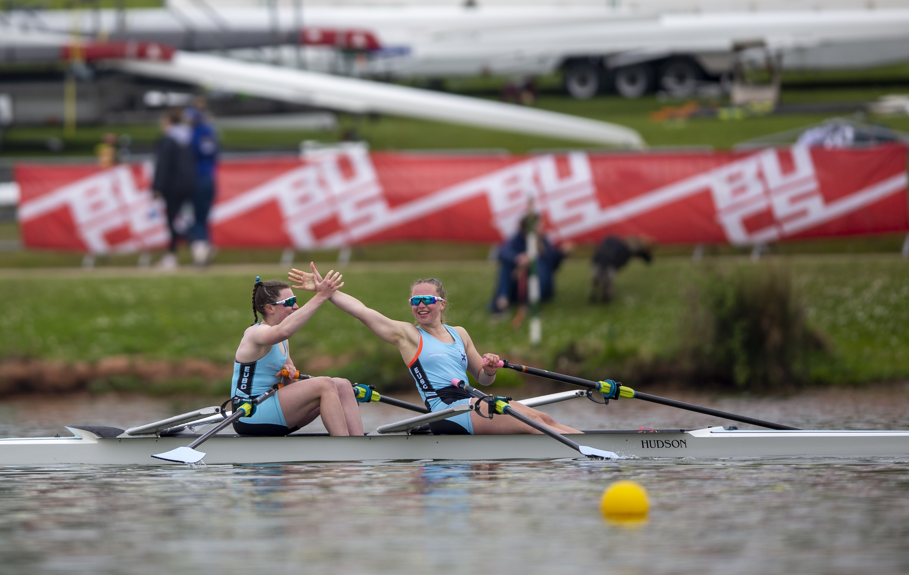 Rowers celebrating on the water