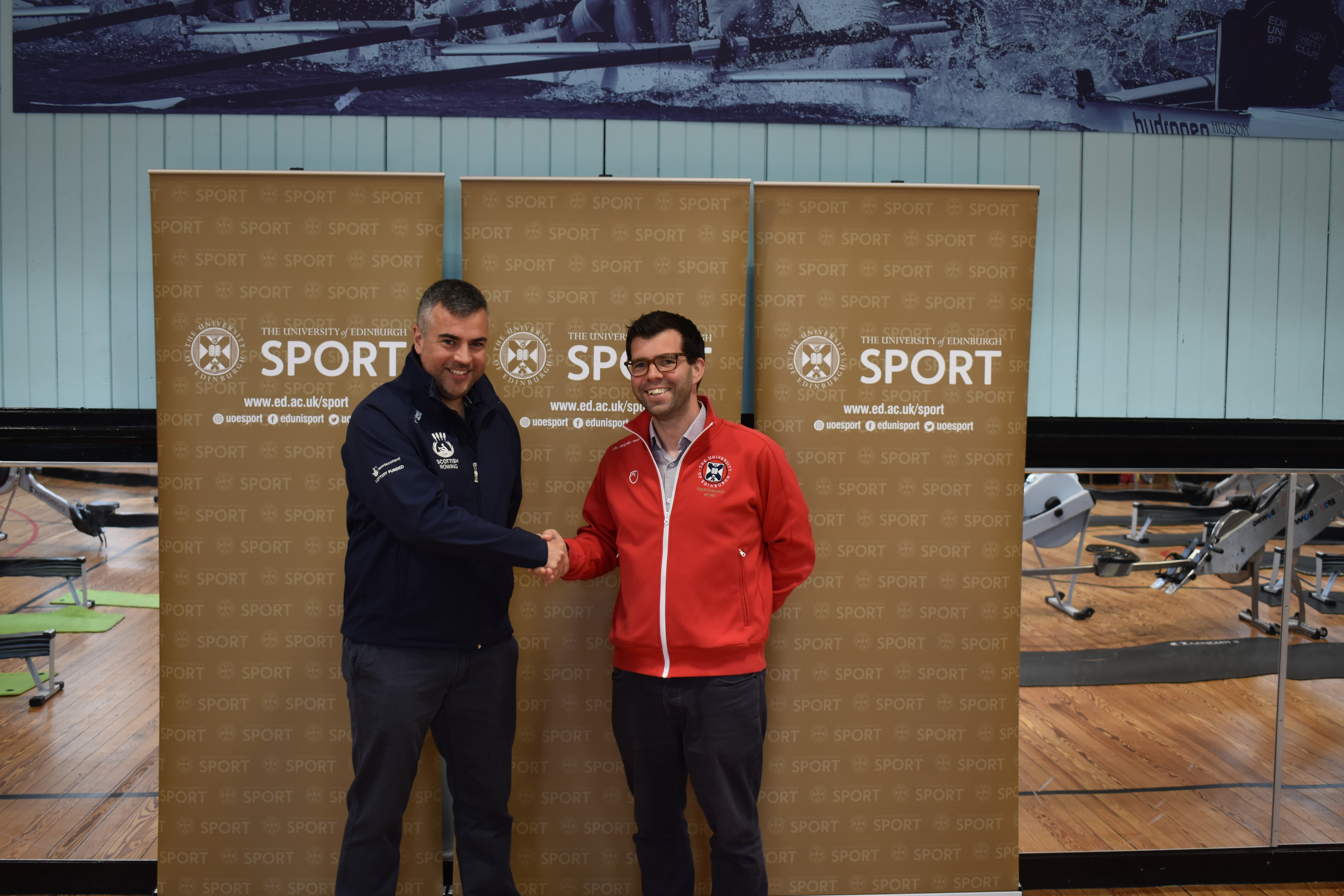 Lee Boucher, Scottish Rowing and Ross Simpson, University of Edinburgh shaking hands