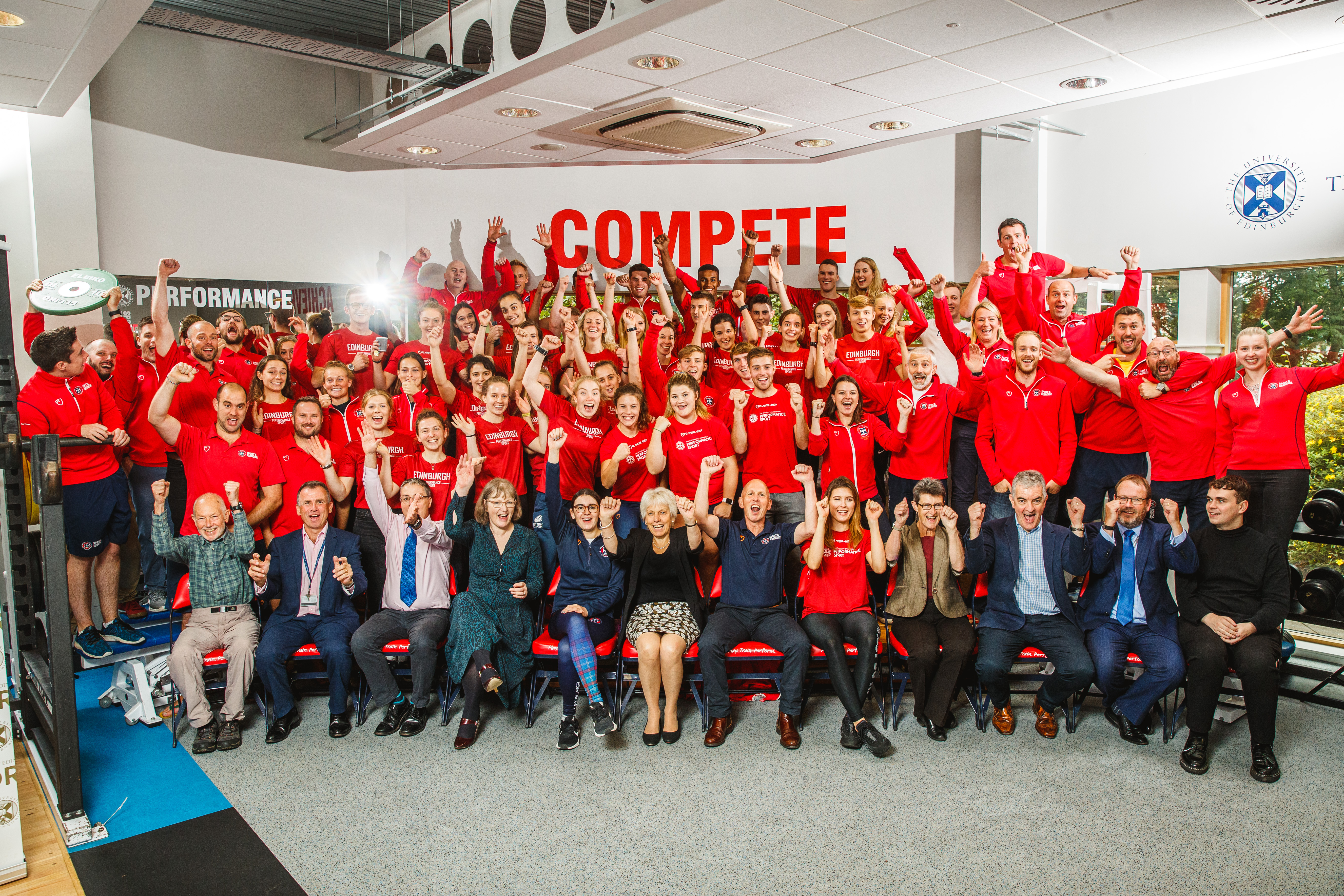 Group photo of Jim Aitken with Performance Athletes