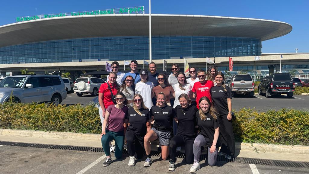 Group of student outside airport 